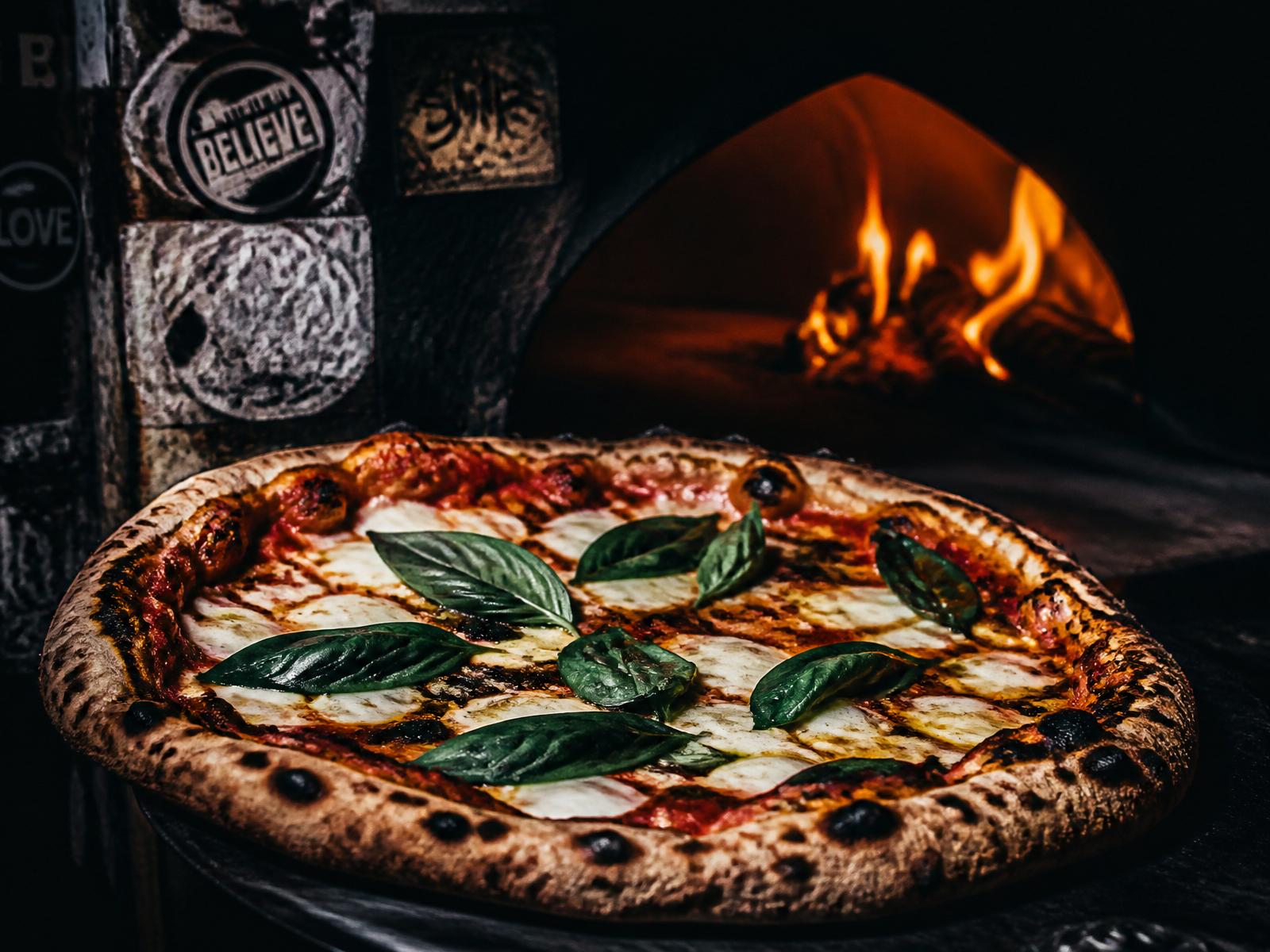 Fresh margherita pulled from the wood fire oven